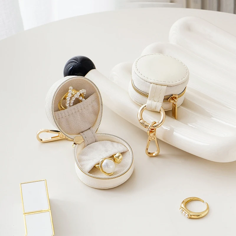 custom logo multyfunctional leather jewelry mini storage case small jewelry travel round organizer display boxes with tassel custom logo multyfunctional leather jewelry mini storage case small jewelry travel round organizer display boxes with tassel